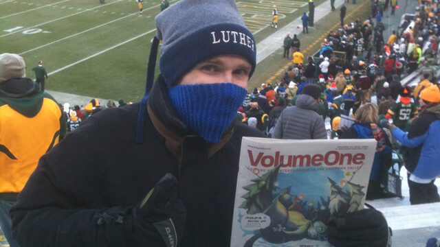 The author (and Volume One) at Lambeau Field for the Packers-Titans game on Dec. 23.