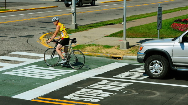 RIDING WITHIN THE LINES. This “bike box” at the intersection of 13th Avenue East and Broadway in Menomonie is designed to make cycling safer.