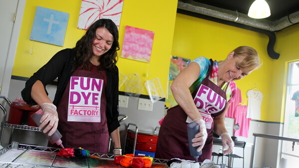COLORFUL CHARACTERS. Bobbi Potter, right, opened Fun Dye Factory in downtown Eau Claire last year after being inspired by a TV show.
