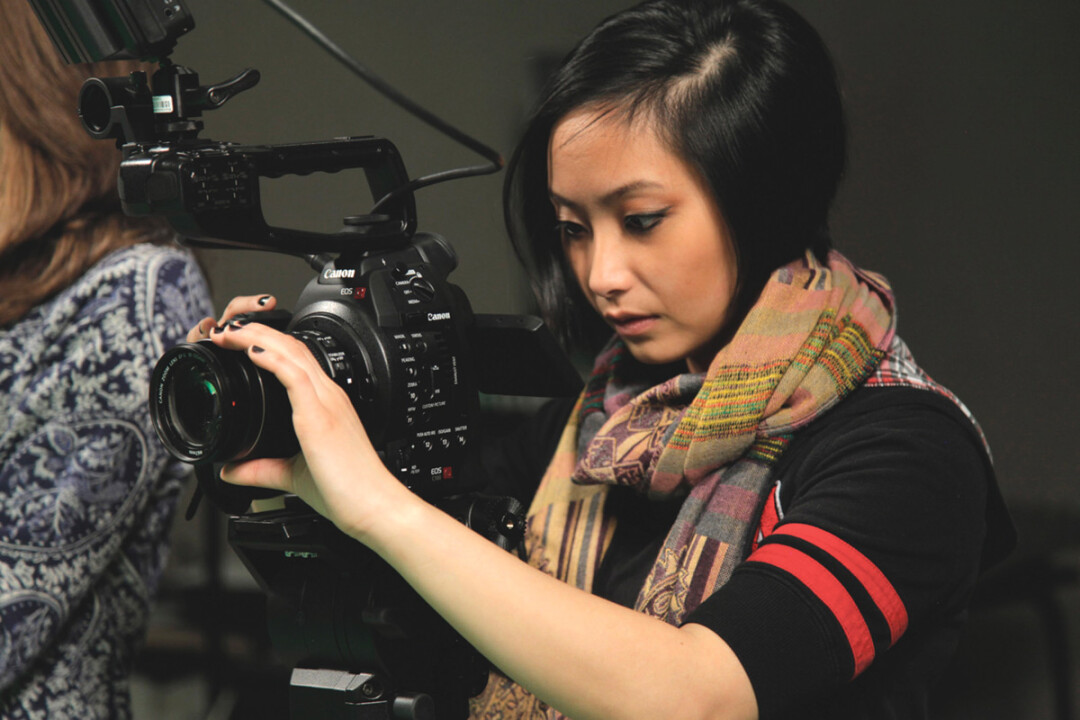 FRIENDS OF THE LENS. UW-Stout student Sarah Moua films for a class project. Stout’s new prgram covers both technical skills and master-class level techniques.