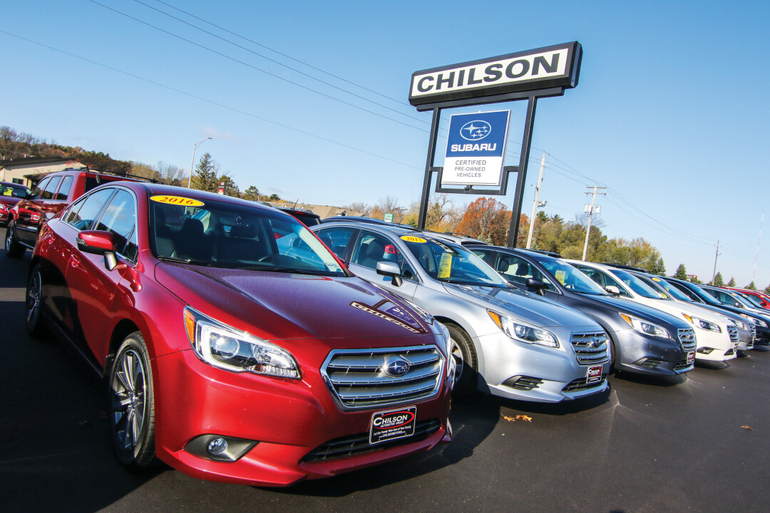 ON THE LOT OR UNDER THE HOOD. Chilson Automotive began with a single car lot in 1959. Owner Bernie Chilson works alongside his seven children in the business’s current form, which employs almost 125 people.