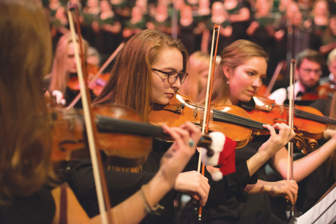 STRINGS THAT RING. This year marks the 43rd annual presentation of UW-Eau Claire’s musical prowess. Several student-powered ensembles converge in the name of holiday joy in Zorn Arena on Dec. 3, so don’t miss out.