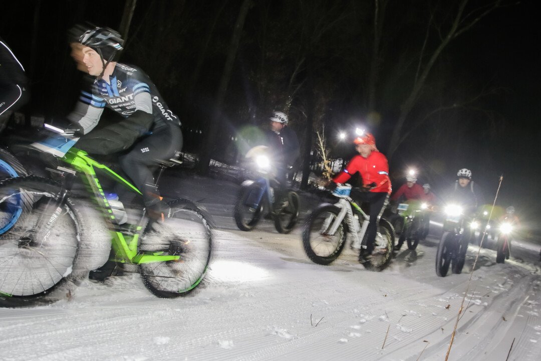 THAT TRAIL IS GETTING PRETTY (FAT) TIRED. On Thursday, January 18, Winter After Hours (in its new location at Pinehurst Park) featured a fat tire bike race hosted by EC Enduro. The weekly event (Thursdays, 6pm) always features sledding, ski trails, skating, music, a bonfire and more. 