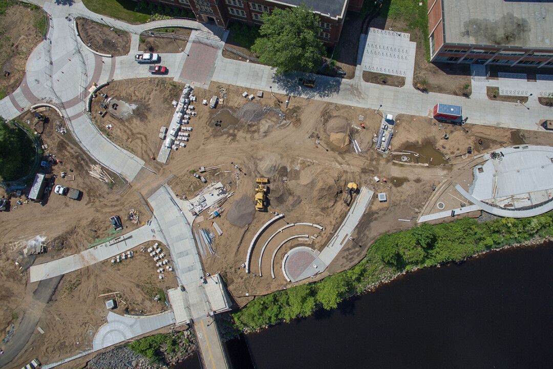 THINGS ARE TAKING SHAPE. This aerial photo shows the scale of the campus construction effort as of early June. Schofield Hall is at the top of the picture.