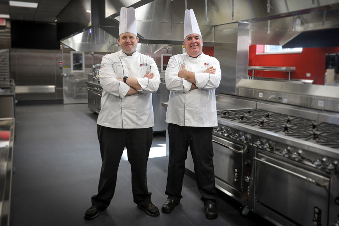 LET’S GET COOKIN’. Chef instructors Jonathan Fike, left, and Kevin Brown, oversaw the creation of an instructional kitchen at Chippewa Valley Technical College.