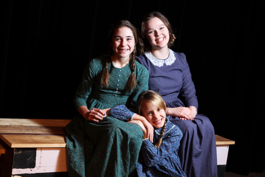 play in the woods. The Eau Claire Children’s Theatre will bring A Little House Christmas to the stage this season, as it did in 2014 with the cast shown above. 