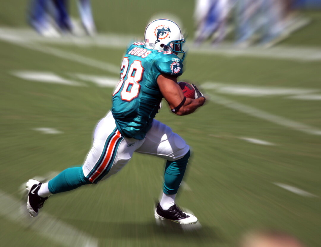 The Miami Dolphins have worn eye-catching aquamarine and coral uniforms since their founding in 1966.