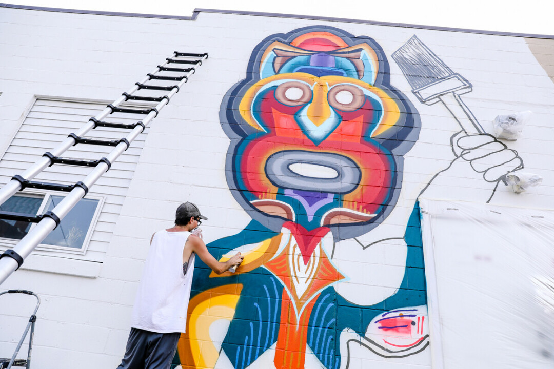 EMPOWERMENT THROUGH ART. Jaden Flores integrates his Mexican heritage and interest in Mayan design into his mural, which is located on the 600 block of Barstow Street in Eau Claire.