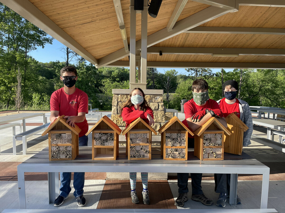 BUSY AS BEES. Local high school student Keanan Vandenbush (not pictured) had help from a colony of helpers to create bee hotels, which you can find  around River Prairie. (Submitted photos by Kelly Vandenbush)