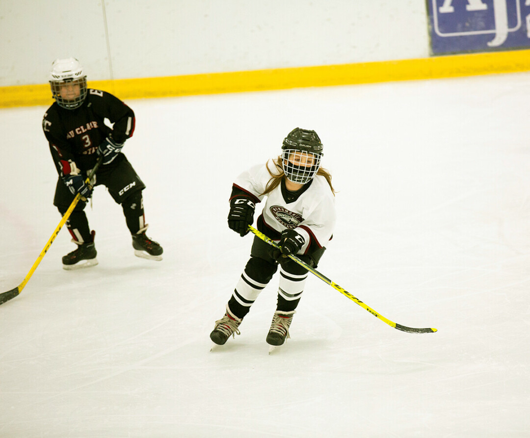 YOU GO, GIRL! Last year, the Menomonie Youth Hockey Association saw a record number of young girls participating in youth hockey. And as the new year welcomes a new sports facility to the Chippewa Valley area, girls have more opportunities to get involved and compete. (Photo by Siri Benrud)