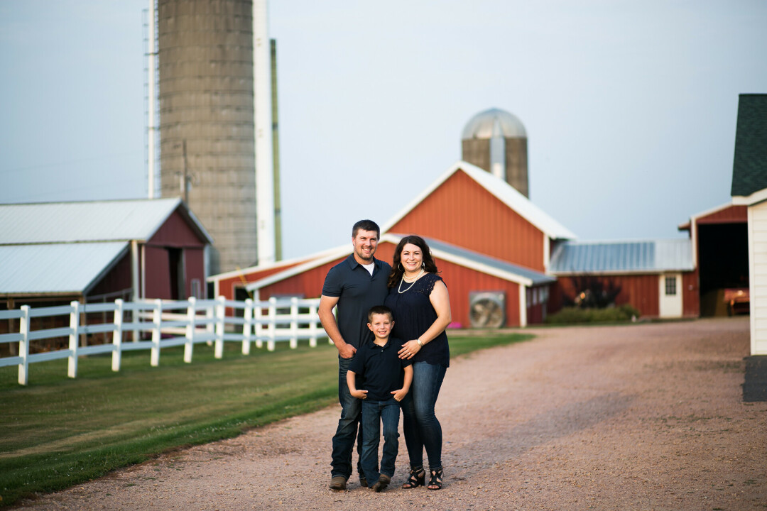 The Klatt family, Danielle, Sean, and son Mason are pictured on their farm.