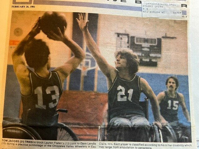 Dave (wearing No. 15 at right) played wheelchair basketball in this 1981 newspaper clipping.