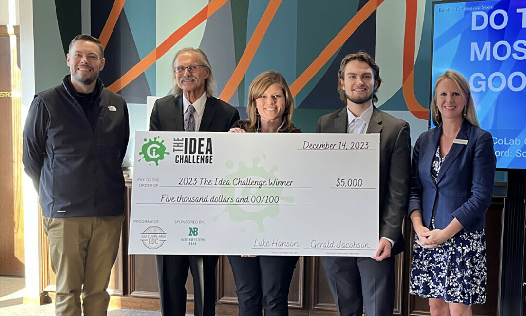 Jackson Anderson, second from right, accepts the grand prize in The Idea Challenge on Dec. 14. (Submitted photo)