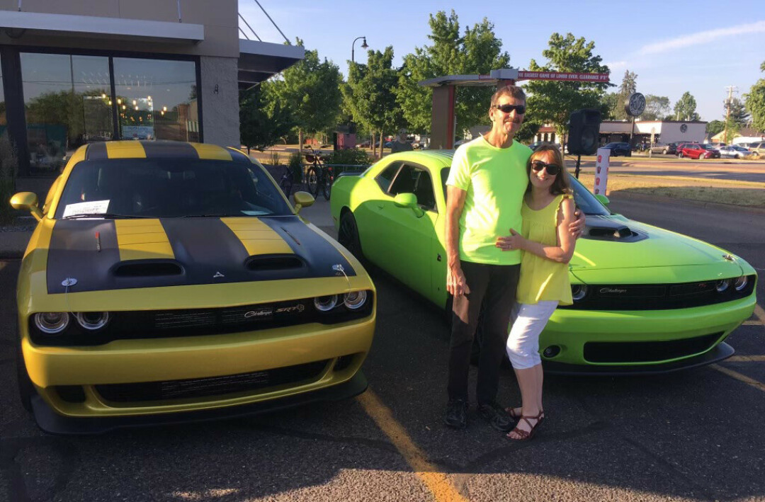 Russ and Deb Thill with their Dodge Challengers. (Submitted photos)