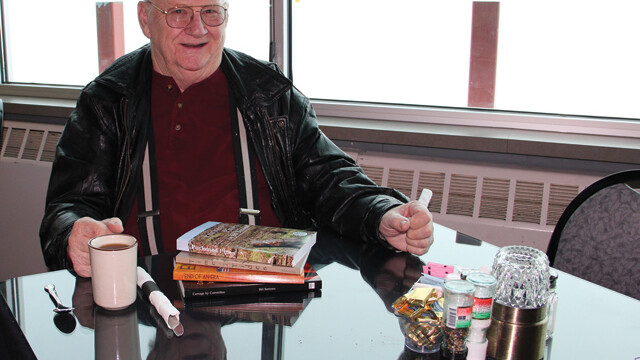 LEAVE THE POT! Local author Bill Bottoms pauses for a cup of joe at Connell’s at the Airport – a favorite hangout for the former pilot.