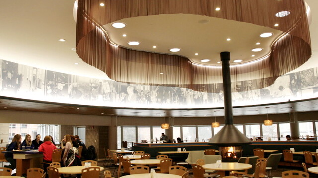 Just one of the many redesigned spaces in UW-Stout’s extremely made over Memorial Student Center. Above: a new fireplace and the hundreds foot long “megagraphic.”