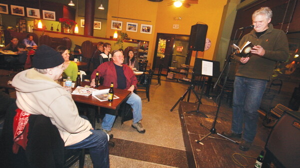 Jon Loomis (shown here at the Acoustic Café) is part of the “Writer’s Read” event.