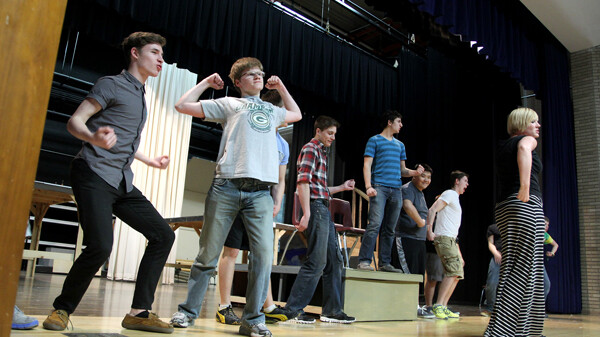 TELL ME MORE, TELL ME MORE! Students rehearse for North High School’s upcoming production of Grease, the first musical the school has produced since the 1990s.