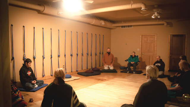 COMMUNAL INSPIRATION. Participants in the Eau Claire Buddhist Sangha, shown here in 2010, meditate together every week at the Yoga Center of Eau Claire.