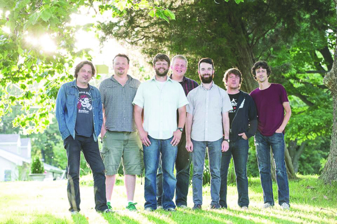 OUTSTANDING IN THEIR FIELD. Singer-songwriter Todd Barneson (third from left) began writing his new album Lay Low upon moving back to Eau Claire, tapping a slew of local musicians.
