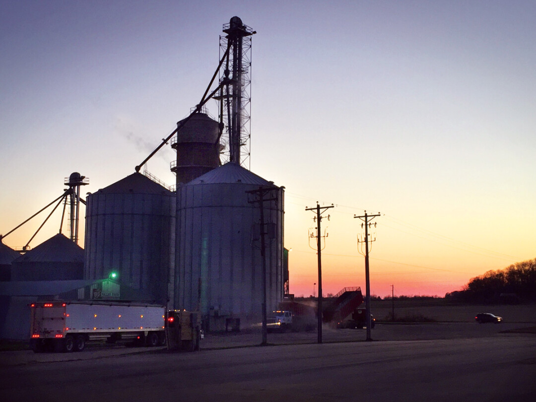 HARVESTING OUR HERITAGE. A grain elevator and drying facility just outside Elk Mound stays busy well into the evenings throughout November. Businesses like this one are filling up fast this autumn, after a particularly good growing season this year.