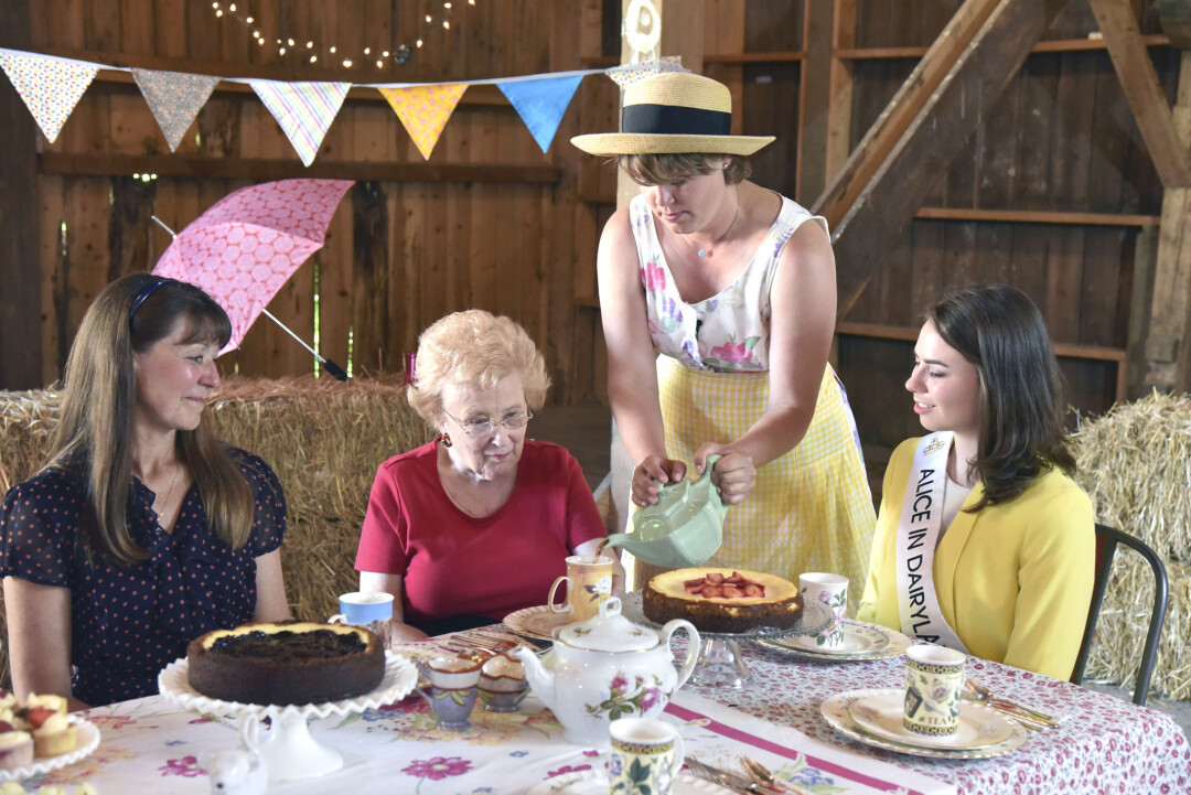 A TEA PARTY FOR 10 ALICES. During a taping of the Wisconsin Public Television program Around the Farm Table, host Inga Witscher serves tea to the current Alice in Dairyland, Ann O’Leary (seated at right), and two of the women who previously held the title Karyan Schauf (left, 1977) and Mary Ellen Jordal (center, 1953).