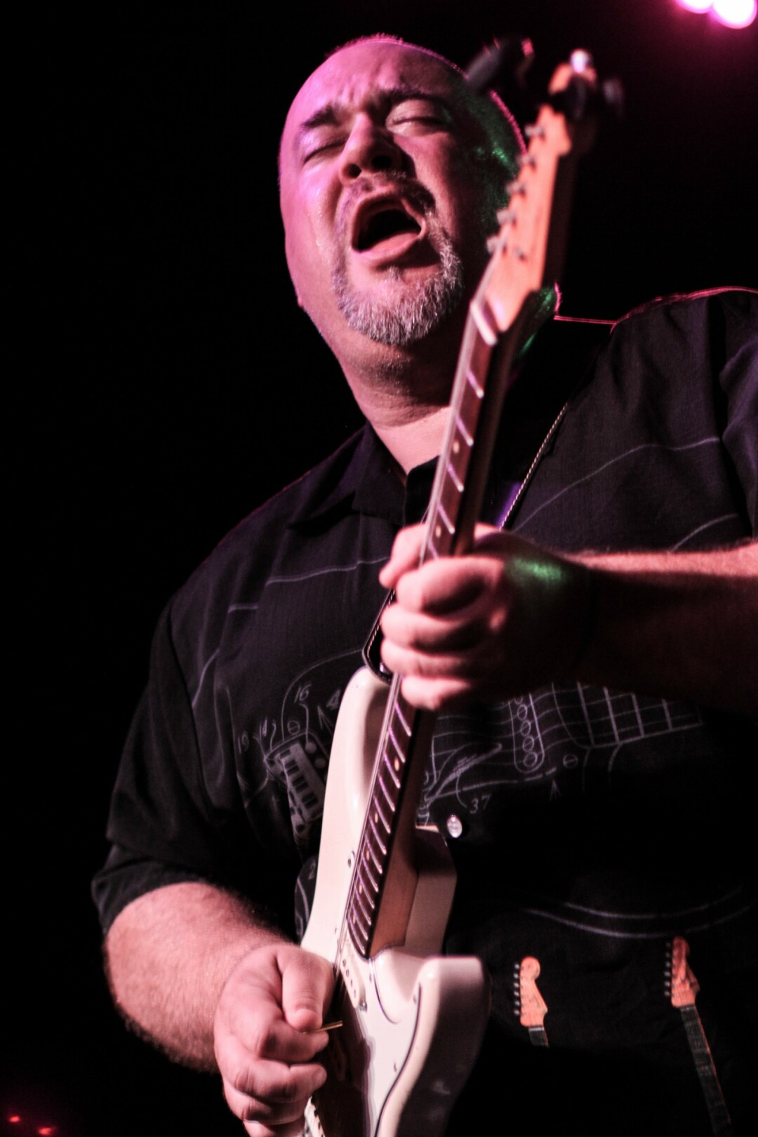 GUITAR HERO. Eau Claire band of yore The Kingsnakes reunited for one last special show at the House of Rock on Friday, July 7 along with South Farwell and The Rattlenecks. Above: Ryan Harrington on the face melting guitar solo. Check out our feature on the House of Rock on page 26.