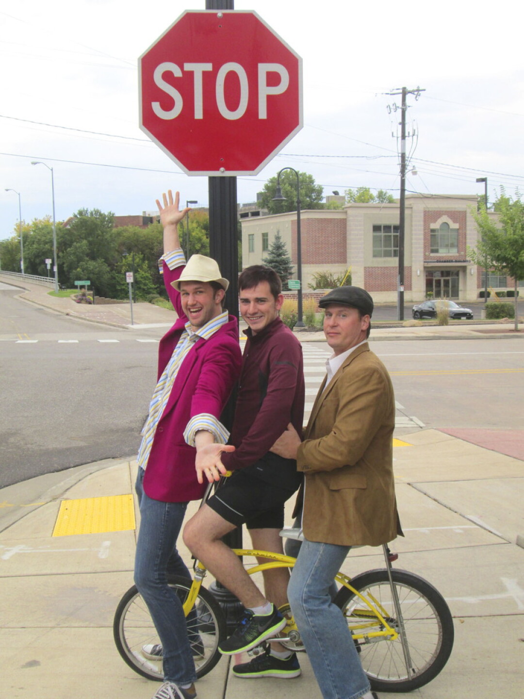 A BICYCLE BUILT FOR … THREE? An Innocent Affair centers on Innocent Smith (Jake Pritchard, left) who disrupts the lives of the other characters, including Arthur (Kyle Miller, center) and Michael (Matt Bartelt).