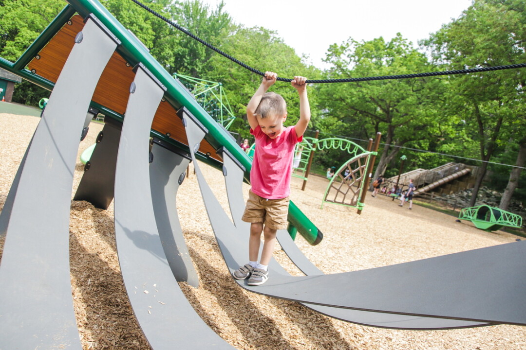 THE SWEET SOUNDS OF CHILDHOOD. The new $480,000 playground at Eau Claire’s Carson Park features equipment designed for children with a wide range of ages and abilities, including children with physical handicaps.