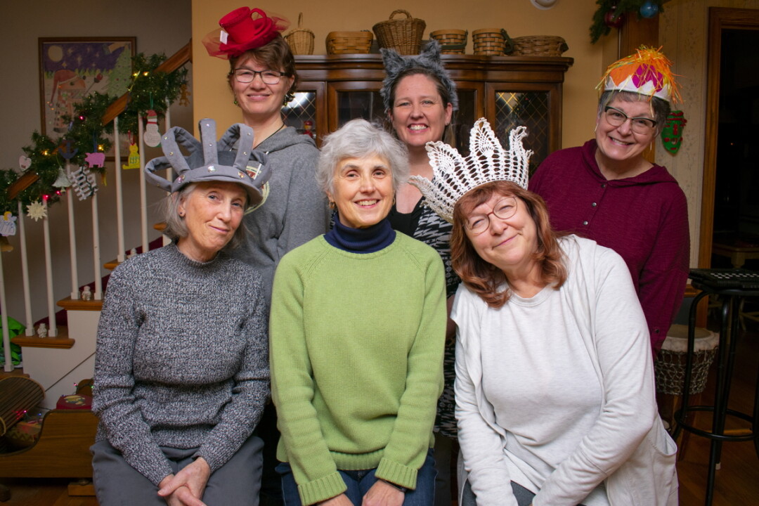 MAD HATTERS.  The Eau Claire Women in Theater don’t usually use costumes, but the silly hats in Alice in Elderland help keep the many characters straight.