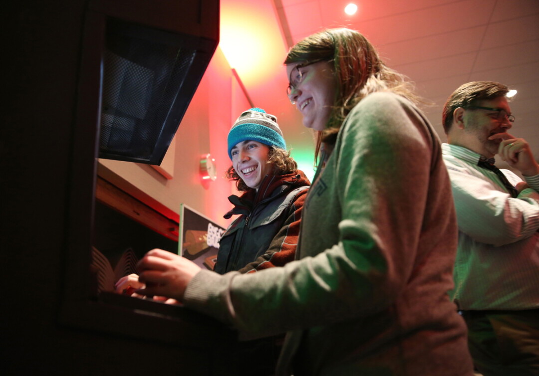 GET YOUR GAME ON, GO PLAY.  Students try a game at a 2017 Stout Game Expo. Students receive feedback from players and learn how to improve their design skills.
