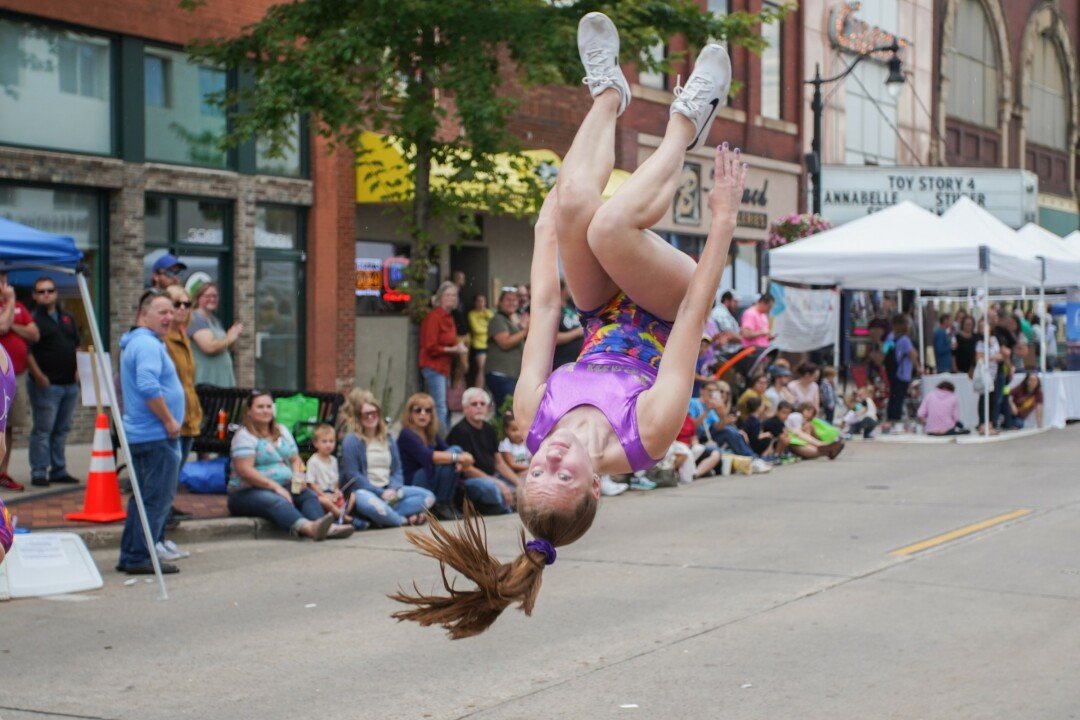A FLIPPING AWESOME TIME WAS HAD BY ALL. Downtown Eau Claire’s annual International Fall Festival took place on Saturday, Sept. 14, shutting down N. Barstow Street for food vendors, booths, a petting zone, and of course,  the big parade.