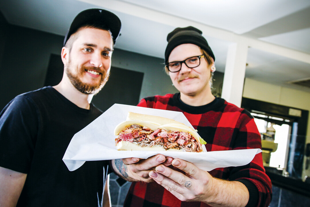 HEARTY MEN WITH HARDY FOOD. Sandwich purveyors Adam Moskiewicz (left) and Justin Allen have opened Jay Ray’s Deli at 1907 Brackett Ave. in Eau Claire.
