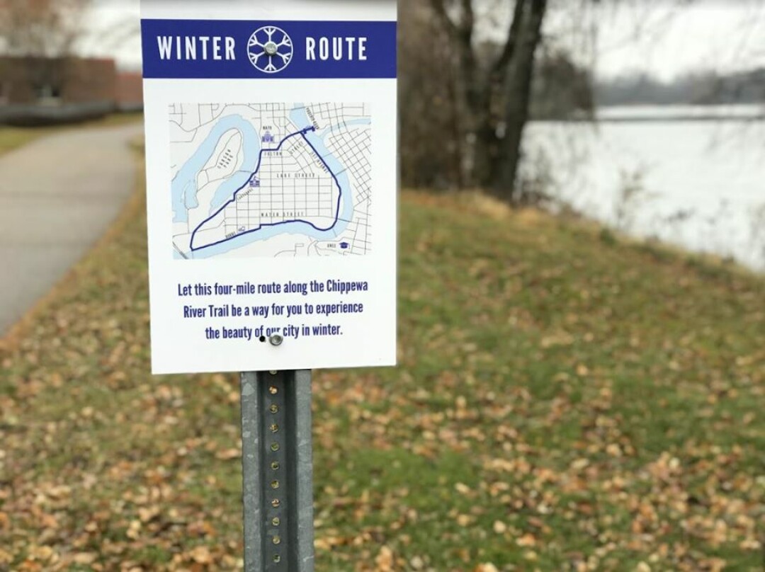SIGN OF THE TIMES. A newly marked Winter Recreation Path through the central part of Eau Claire will be given snow-removal priority this winter. the path is the brainchild of Wintermission Eau Claire. 