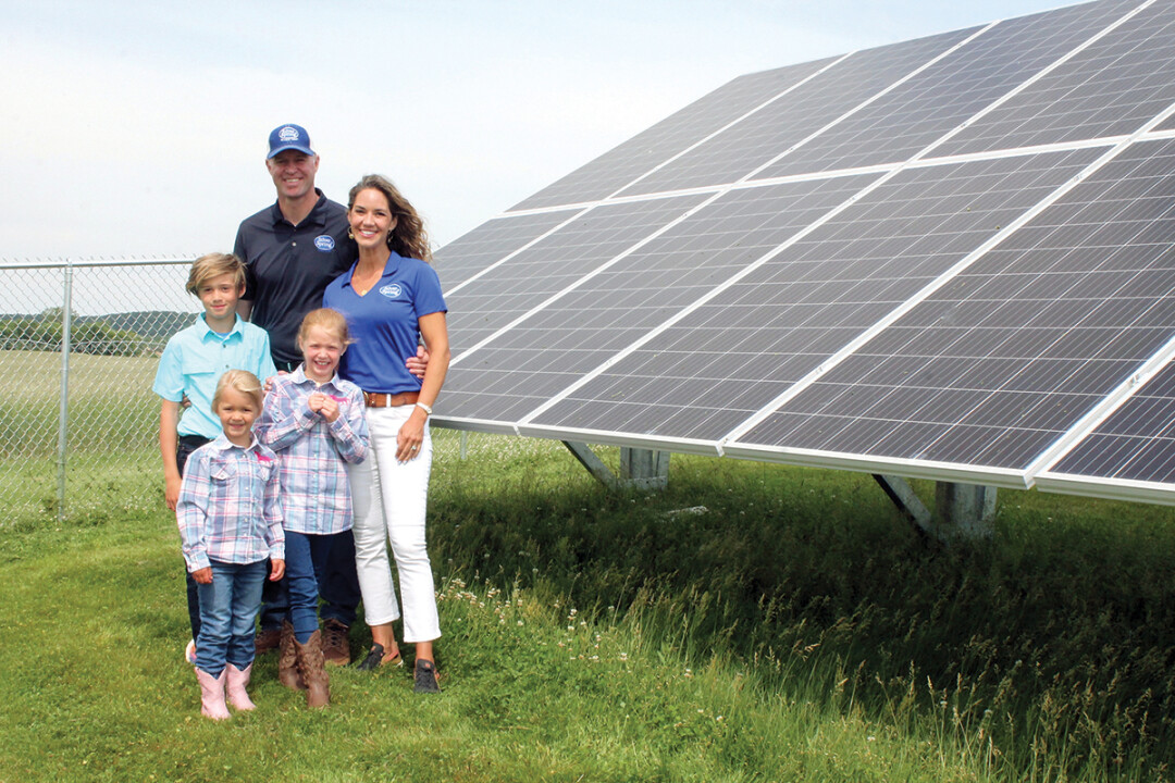 FAMILY ROOTS. Silver Spring Foods President Eric Rygg and his family stand by a newly installed solar array at Huntsinger Farms outside Eau Claire. Silver Spring is the largest grower and processor of horseradish in the world. (Submitted photos)
