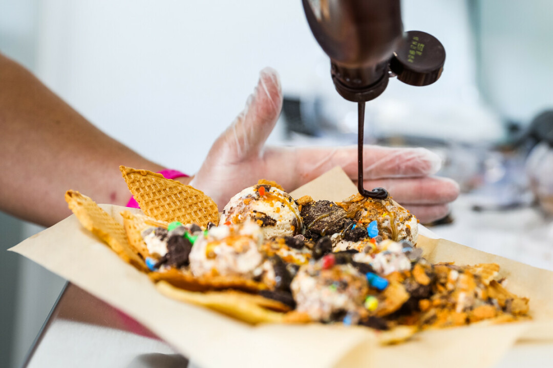LIVIN’ THE CREAM. One of 44 Below’s signature ice cream concoctions is their waffle nachos, loaded with chocolate goodies. There’s a slew of sweet treats available at this new shop, located at 1488 Front Porch Place. 