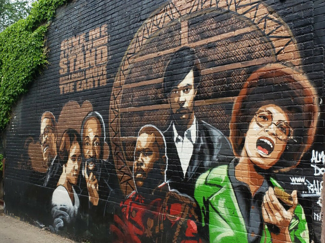 FAMOUS FACES. This mural featuring noteworthy Black Americans is up near the site in Minneapolis where George Floyd was killed by police in May. (Photo by David Carlson)