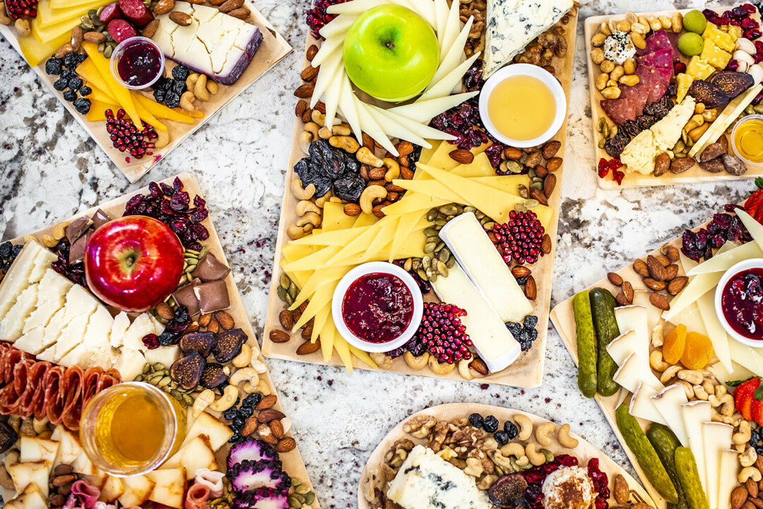 SAY CHEESE! A collection of Leonard’s cheese platters from the Grater Good. / Photo courtesy Christine Leonard and Maria Claire Photography