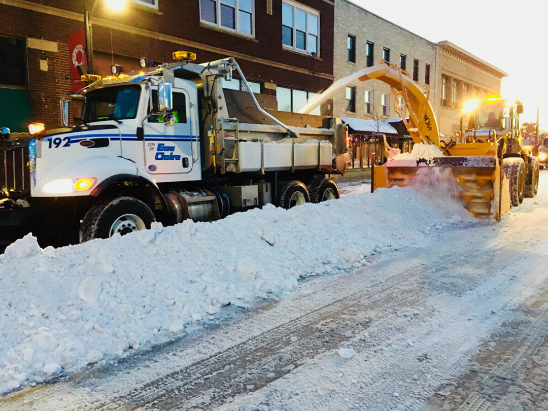 OH, SO THAT'S WHY WE HAVE ALTERNATE SIDE PARKING. A City of Eau Claire snow-removal team at work. (Photo via City of Eau Claire)