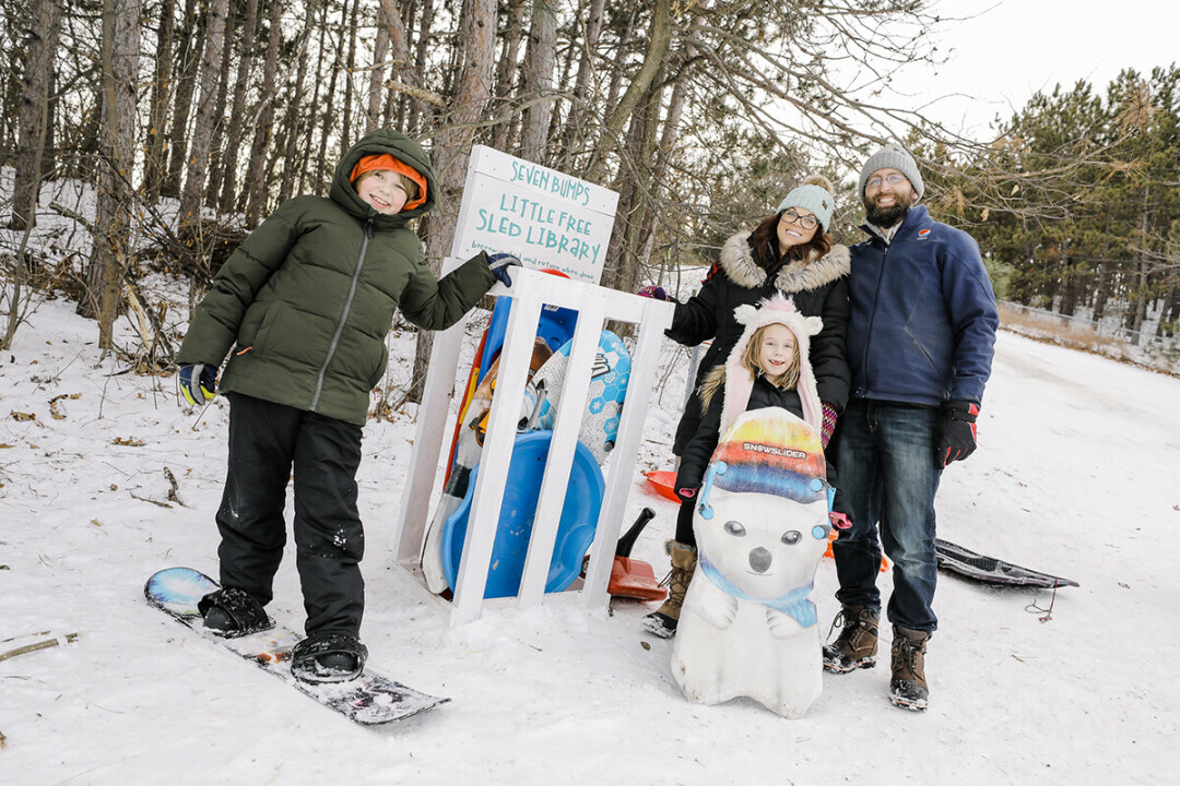 LITTLE FREE SLED LIBRARY. Last year, the Rowekamp family created the area's first Little Free Sled Library at Seven Bumps. From left to right: 