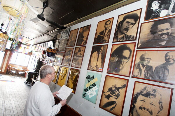 THEY ALL PLAYED IN THIS JOYNT. The tavern's walls include photos of the musicians who played there in the 1970s and '80s. (Photo by Andrea Paulseth)