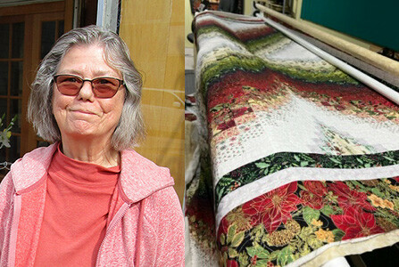 Carol Johnson with the Christmas quilt she created with her new longarm machine. (Submitted photo)