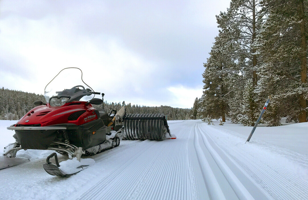 Grooming a cross country skail. The tracks at right are for classic skiing, while the 
