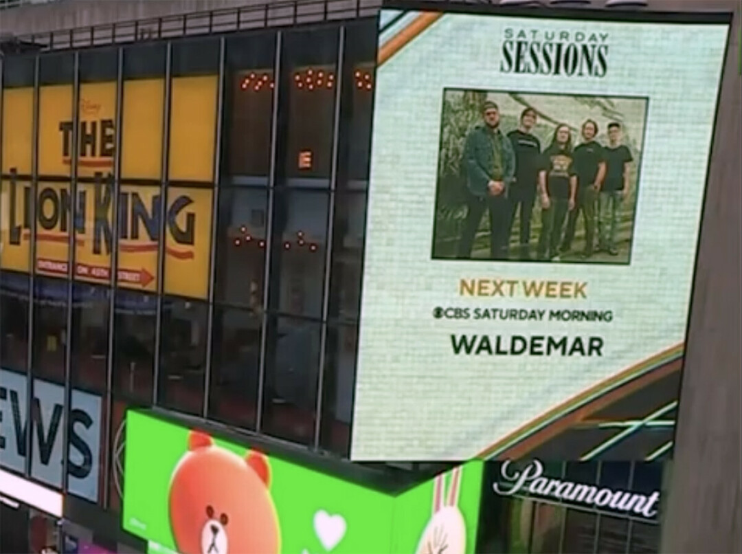 SURREAL EXPERIENCE. One of the CBS producers sent the band this image of their picture on Times Square.