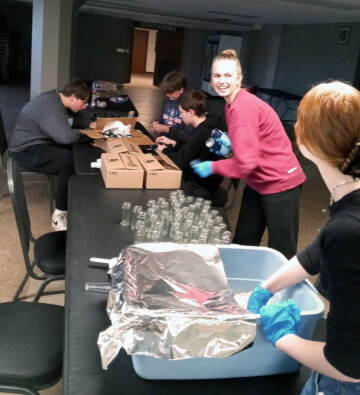 Altoona High School DECA students pack A Holiday Spice Co. spice blends. (Submitted photo)