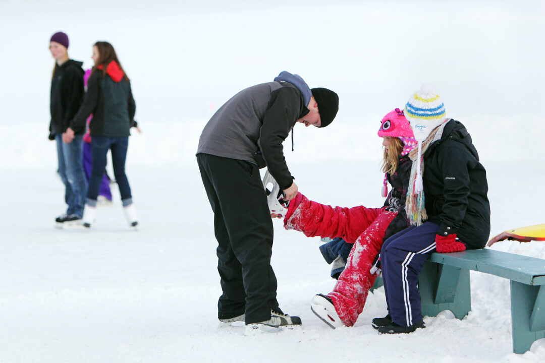LACING UP AT PINEHURST. Eau Claire's outdoor rinks won't be ready until the mercury falls, the city says.