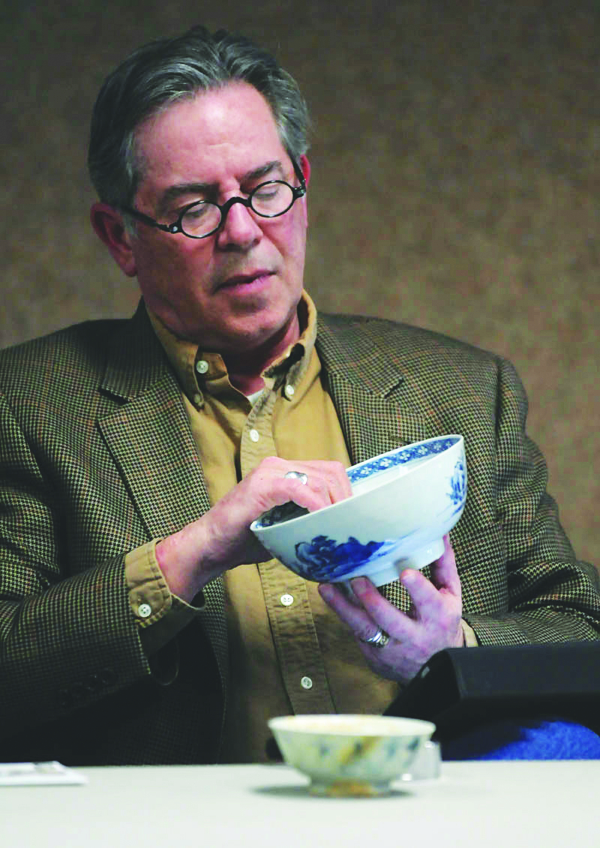 Mark Moran checks out some bowls. “Pretty nice bowls,” he says.