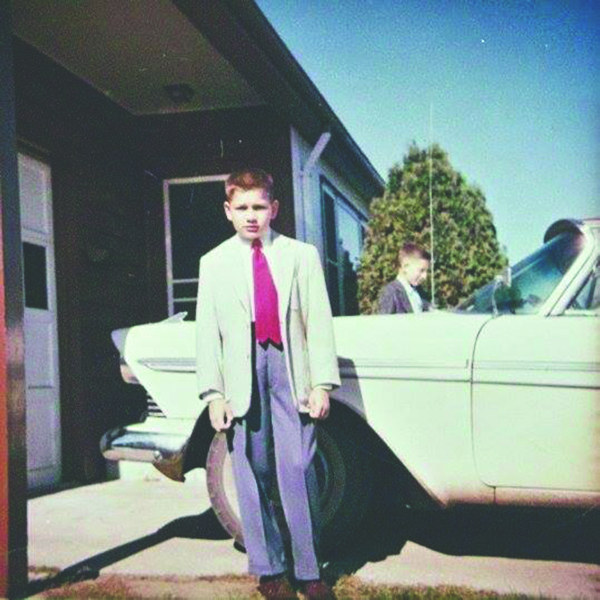 SAD PANTS. This is a photo of ’58 Belvedere guitarist Dean Granros as a kid in front of his dad’s car. The jazz trio used the photo as album art with their single, “I Don’t Know.”