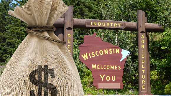 Notice which side of the state line the enormous money bag is on. GET IT?
