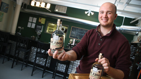 Owner Matthew Rick shows off Infinity Beverages' brandy, released earlier this year.